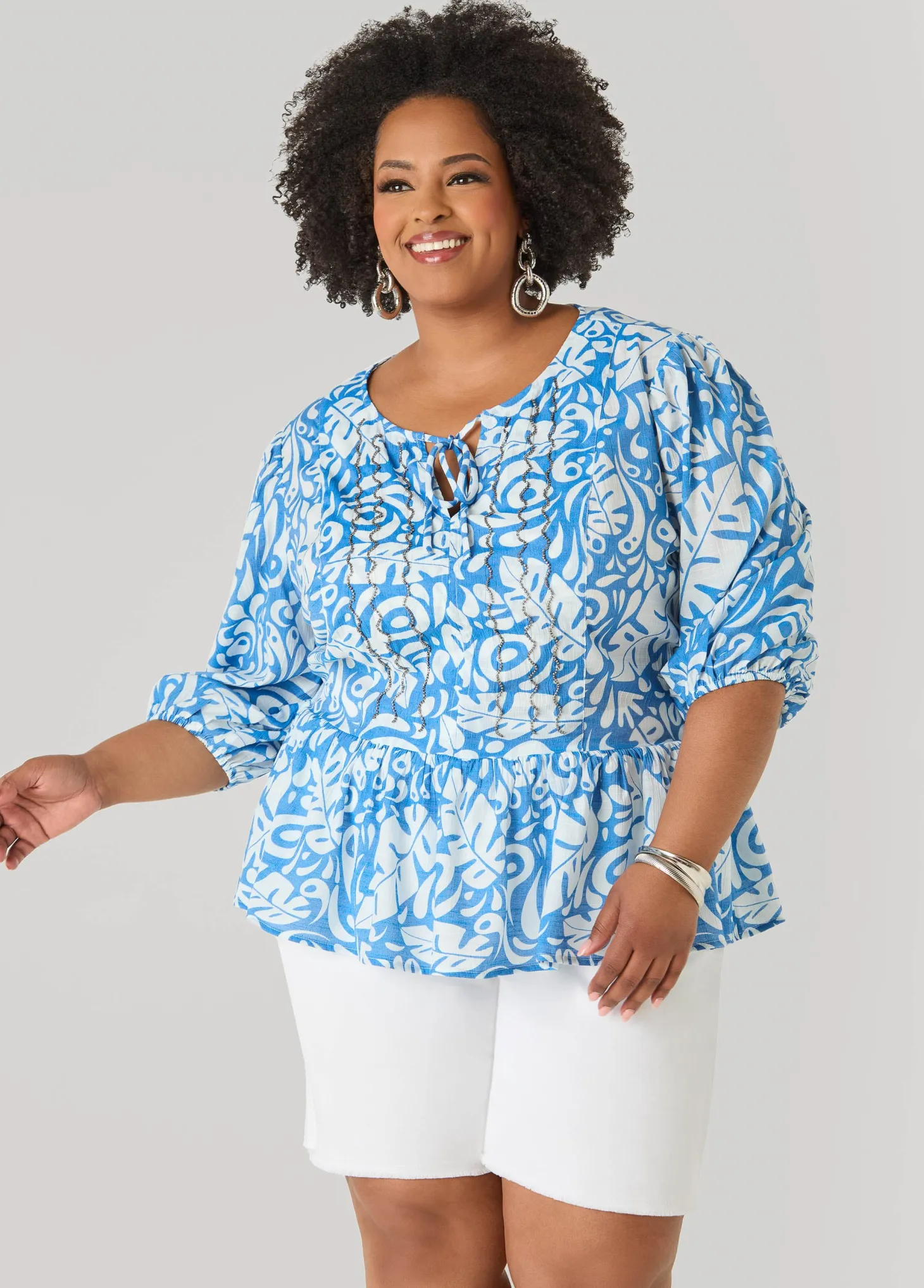 Beaded Leaf Print Peplum Blouse
